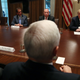 President Donald Trump, right, talks about his meeting with Russian President Vladimir Putin, during a meeting with House Republicans in the Cabinet Room of the White House on July 17, 2018 in Washington, DC.